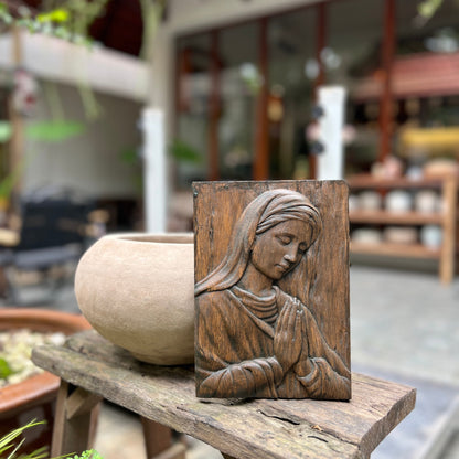 Wood carving of the Virgin Mary in prayer | The icon of the Virgin Mary in prayer