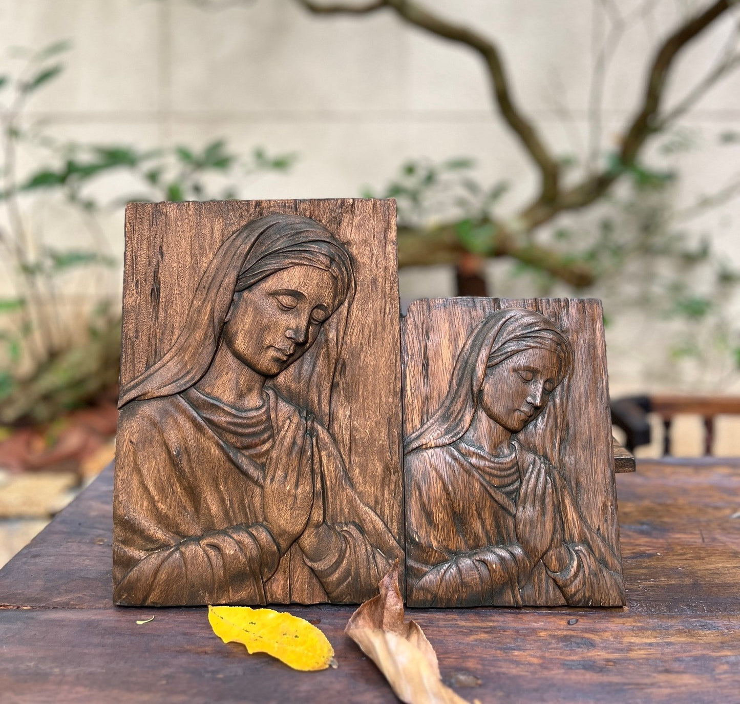 Wood carving of the Virgin Mary in prayer | The icon of the Virgin Mary in prayer