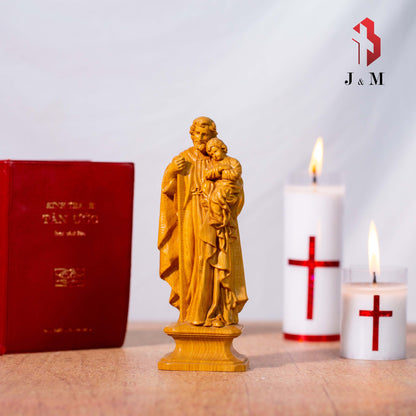 The statue of St. Joseph Holding Baby Jesus 7.9in/ 11.8in