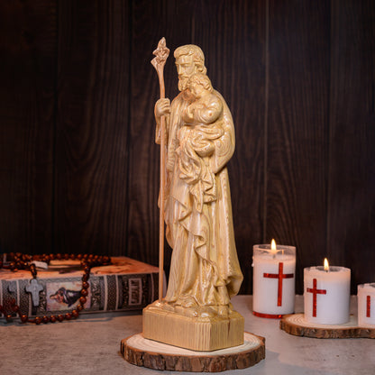 The statue of St. Joseph Holding Baby Jesus 7.9in/ 11.8in